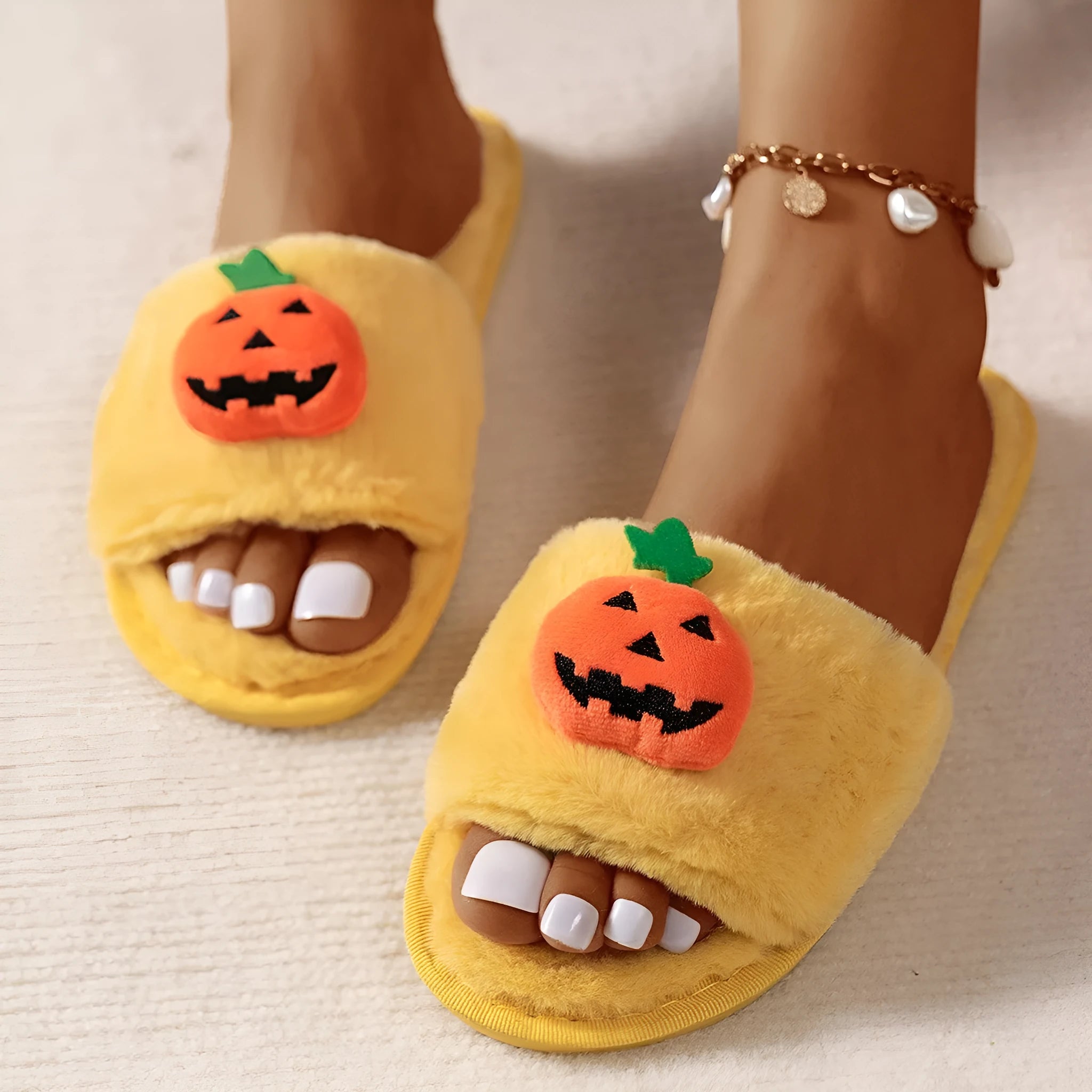 White and yellow pumpkin plush open toe slippers with synthetic fur uppers and PVC soles