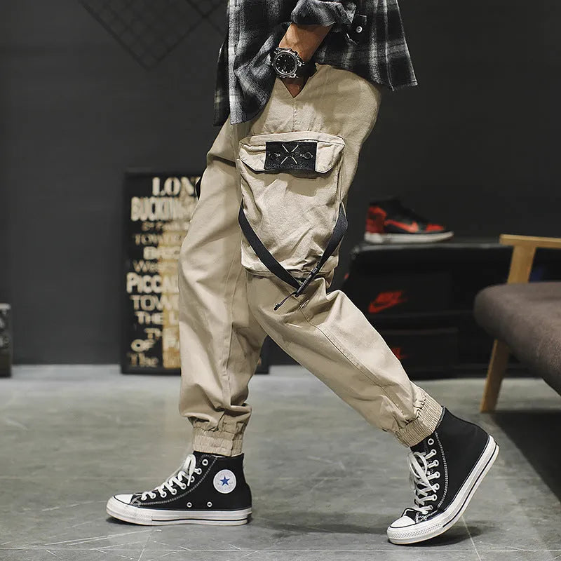 Men's cotton cargo pants in black, grey, and khaki, casual multi-pocket trousers with size chart.