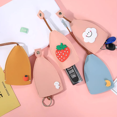 Cartoon pull-out key case in PU leather measuring 14 by 7.5 centimetres
