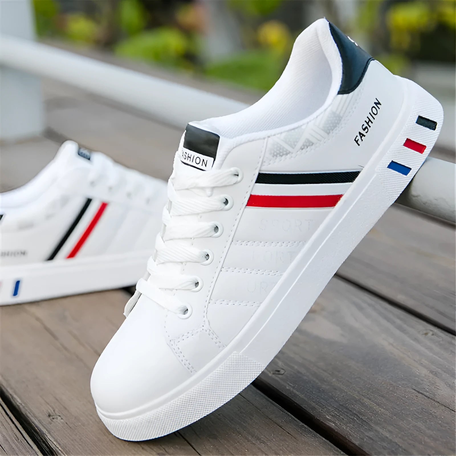Men's sports shoes in black, grey, and white colours showing size options from UK 39 to 44