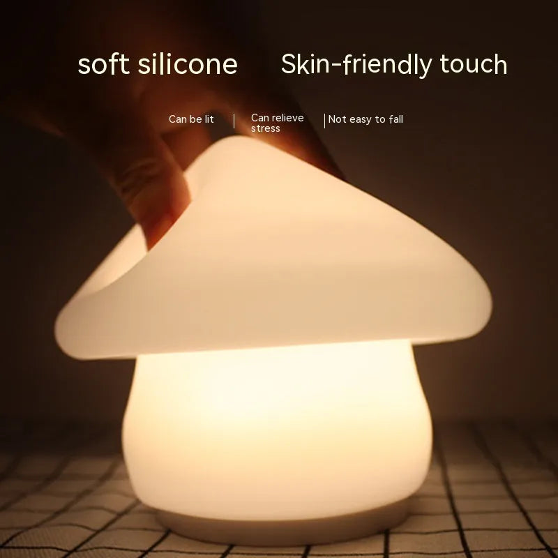 White silicone mushroom night lamp with USB cable showing cold and warm light modes