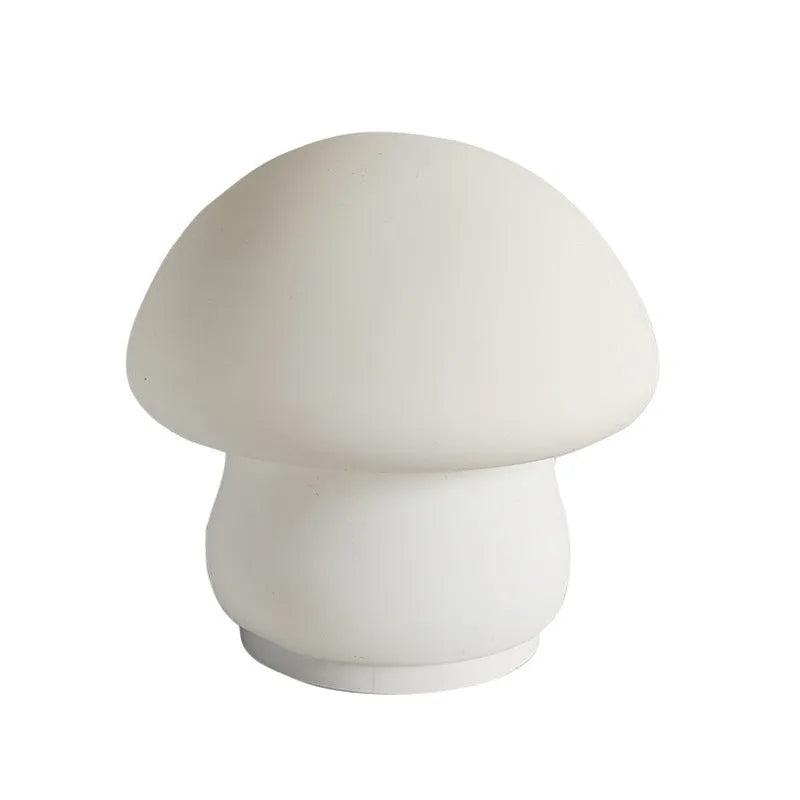 White silicone mushroom night lamp with USB cable showing cold and warm light modes