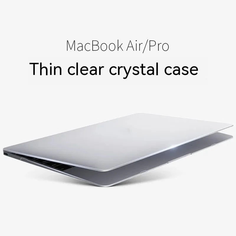 MacBook Pro laptop with a crystal transparent protective hard shell case snapped onto its lid and base.