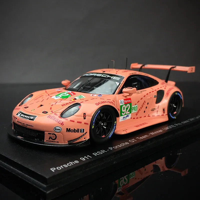 Pink 1:64 scale resin Porsche supercar model body, approx. 7 x 3.2 x 2 cm, with 10 x 4 x 3.5 cm display box
