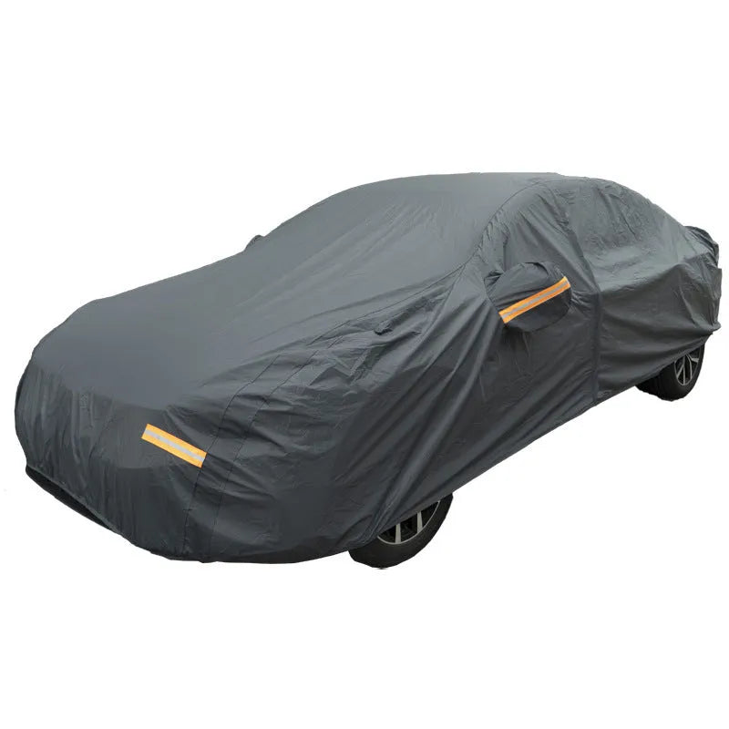 Grey PVC car cover for Volkswagen models shown fitted on a car, illustrating rainproof and sun protection design.