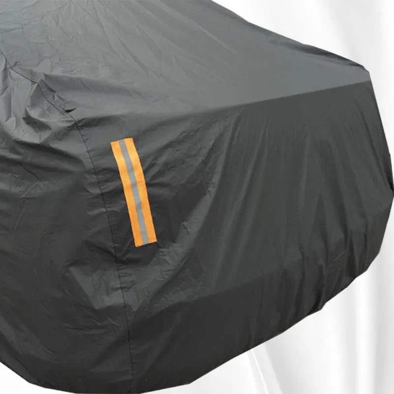 Grey PVC car cover for Volkswagen models shown fitted on a car, illustrating rainproof and sun protection design.
