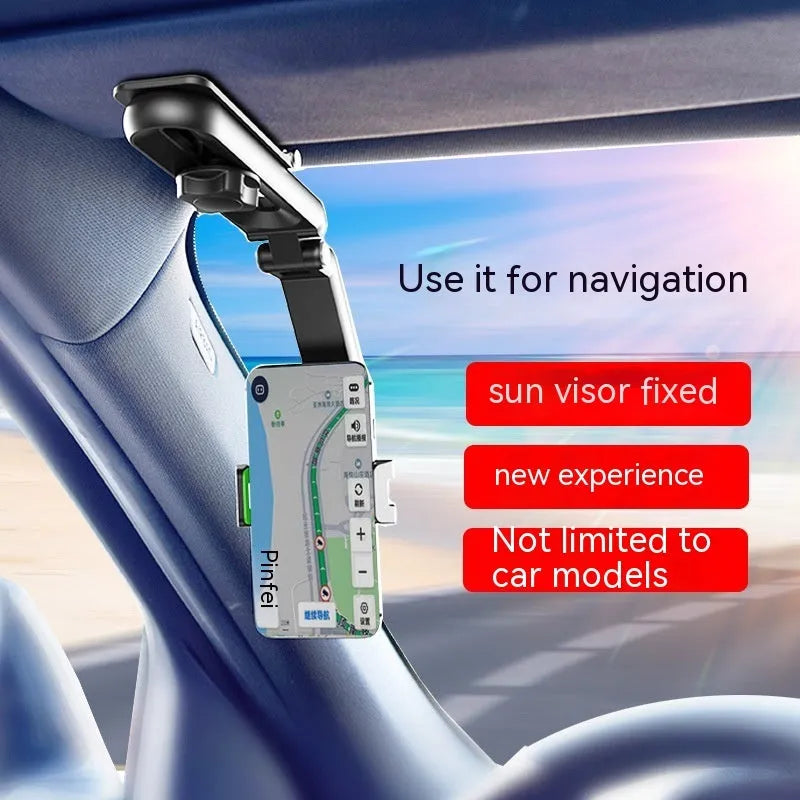 Black and green car phone holder with clip mount on a car dashboard