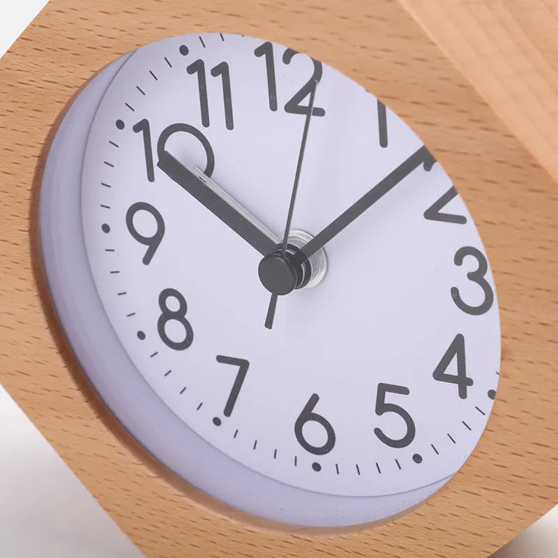 Polygonal beech wood luminous alarm clock with hexagonal shape in brown white finish on nightstand