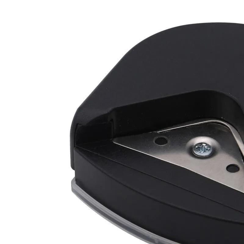 Business card corner cutter in black, blue, or pink colours showing plastic and metal construction