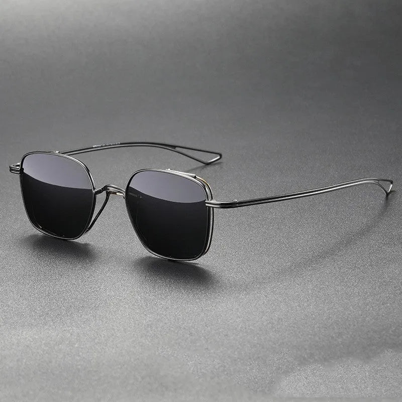 Polarized sunglasses with pure titanium frame in box style, gun mount colour with black and gray lenses