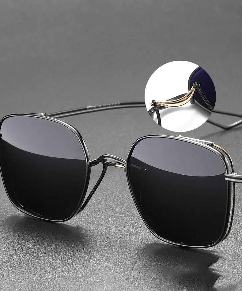 Polarized sunglasses with pure titanium frame in box style, gun mount colour with black and gray lenses