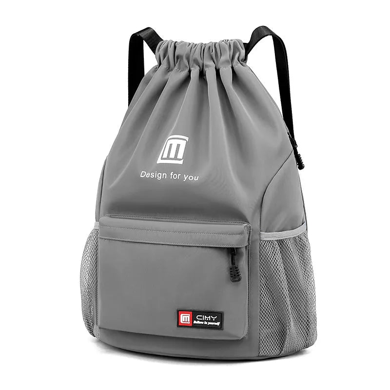 Water-repellent Oxford travel backpack with drawstring closure in black colour showing bucket shape and double shoulder straps