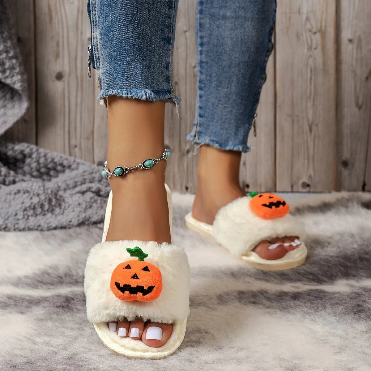 White and yellow pumpkin plush open toe slippers with synthetic fur uppers and PVC soles