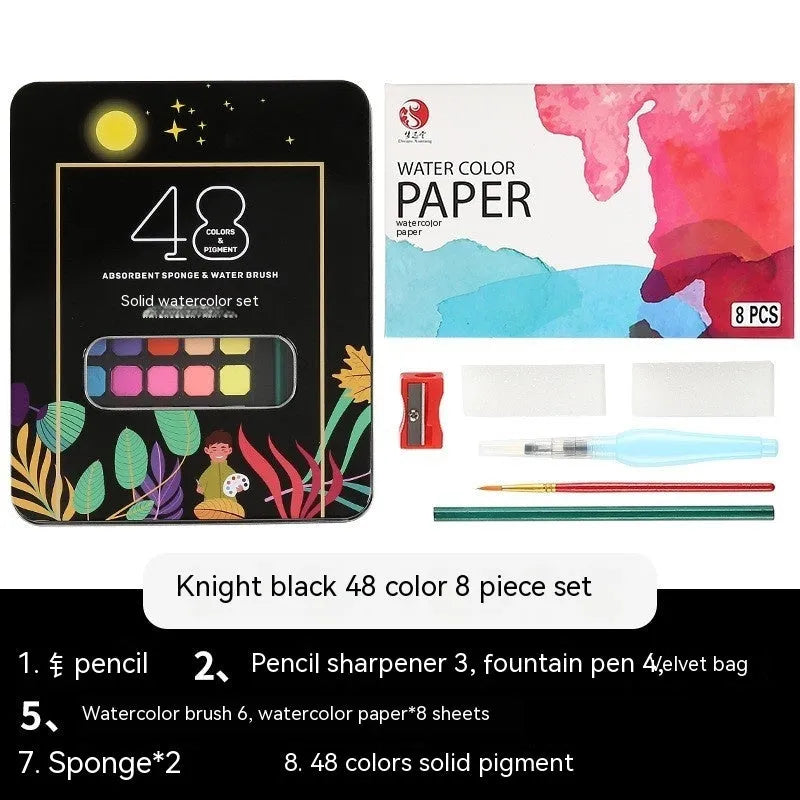 Open box showing 48 solid watercolour paint cakes in various colours including black knight, pink, and blue.