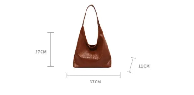 Soft PU leather casual shoulder bag with sandwich pocket in multiple colour options.