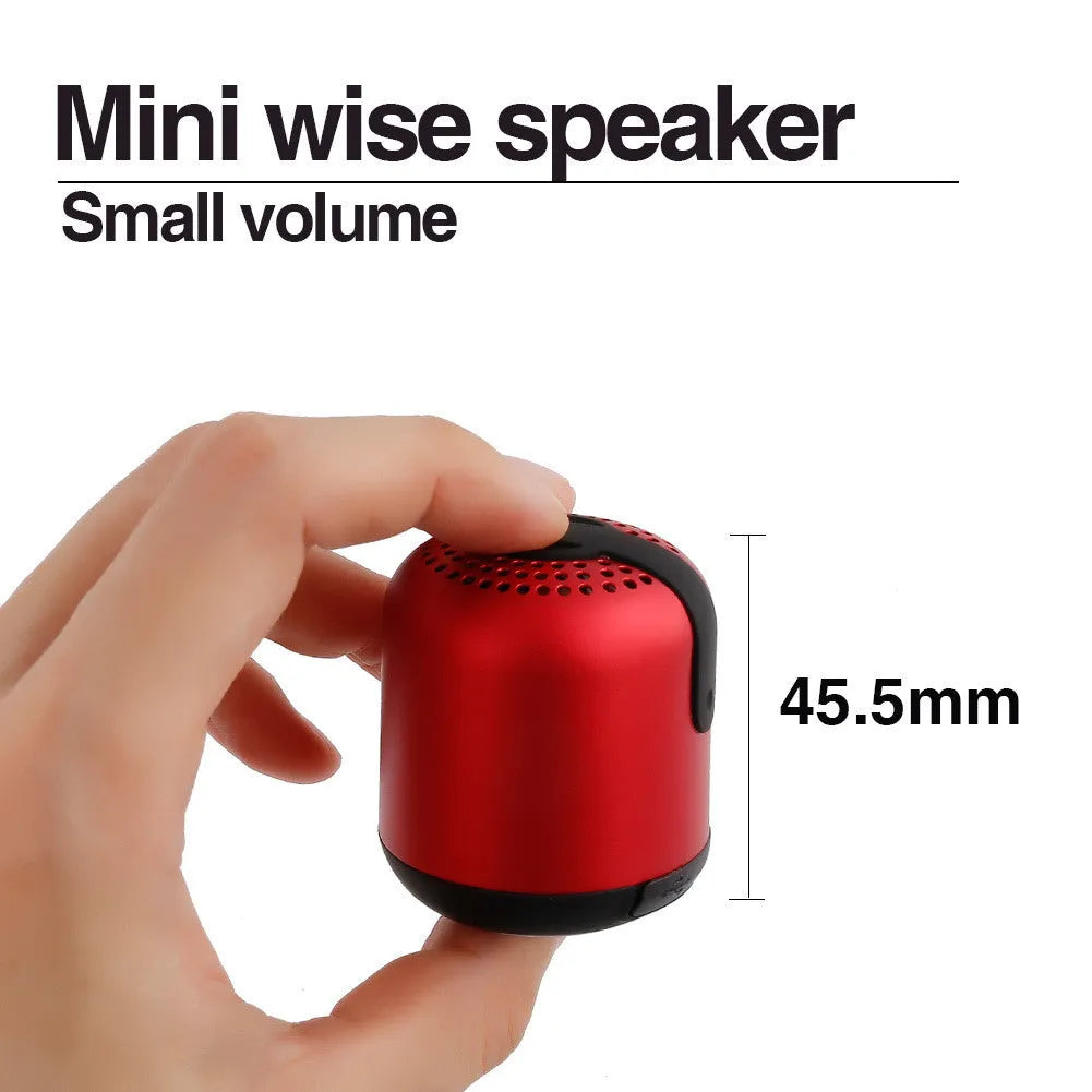 Hieha XQ11 cylindrical metal waterproof Bluetooth speaker in silver colour on a table