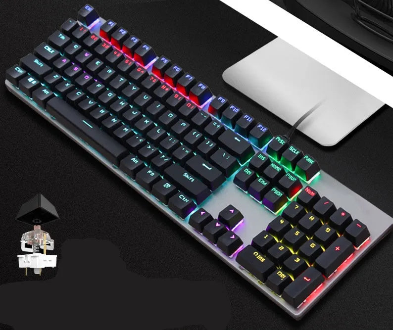 AOC GK410 wired mechanical keyboard with metal body and white backlit keys on a dark desk.