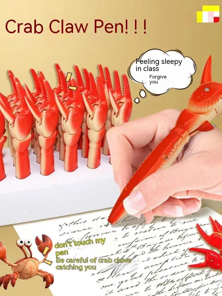 Colourful crab claw ballpoint pen with metal clip shown on a notebook.