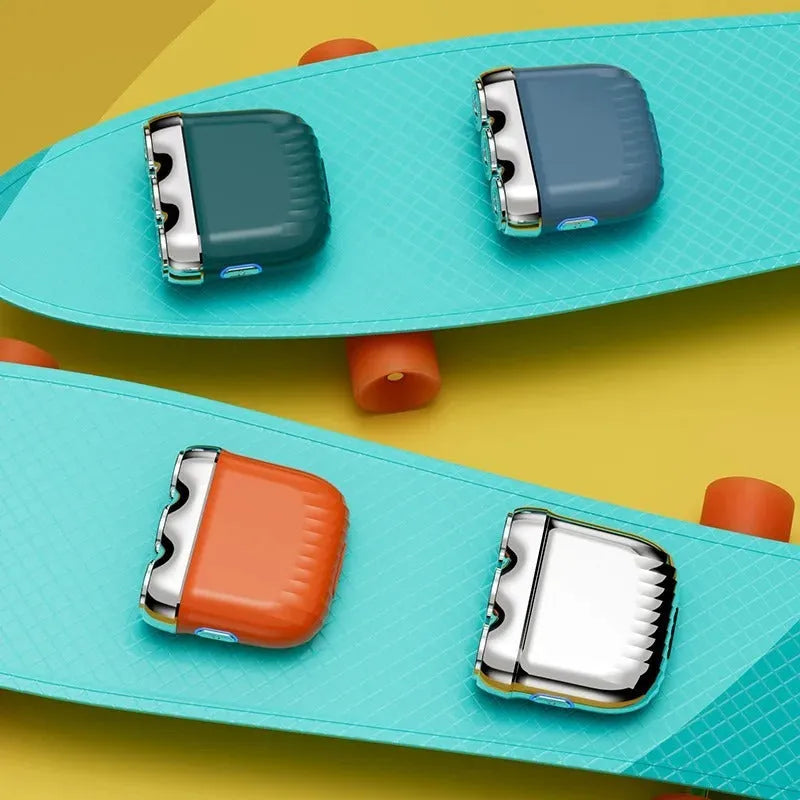 A mini three-head magnetic electric shaver in gun colour, orange, green, or blue, shown with its floating cutter head.