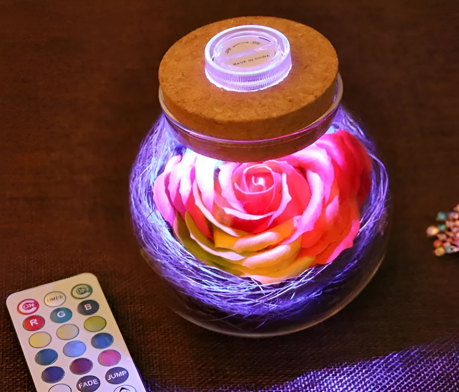 Colorful rose soap flower in glass wishing bottle with four colour options for decor or gift