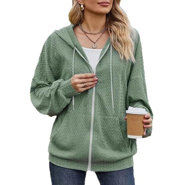 Green women's loose-fit hooded zip coat with front zipper, long sleeves, and a casual style.