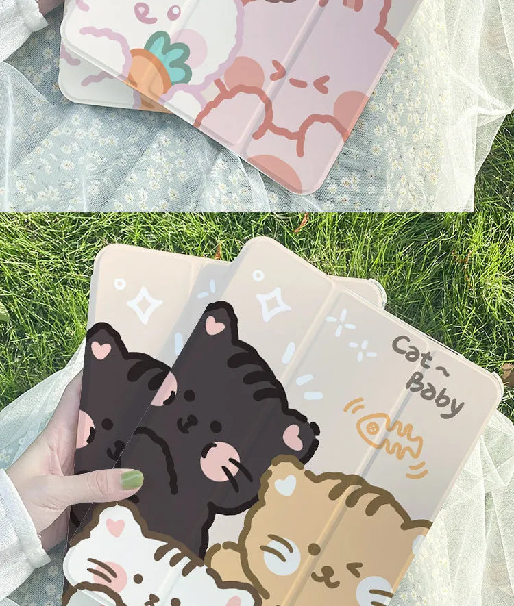 Silicone tri-fold protective case for iPad in a rabbit cartoon design, shown folded as a stand.