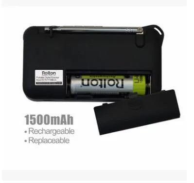 Golden Rolton W405 portable FM radio and MP3 speaker with LED display on a textured surface.