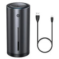 Black aluminium alloy car diffuser humidifier with USB cable, emitting cool mist for vehicle or desktop use.