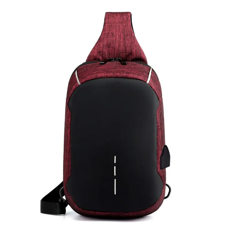 Dark blue waterproof oxford chest bag with adjustable strap, showing front zipper and compact square shape.