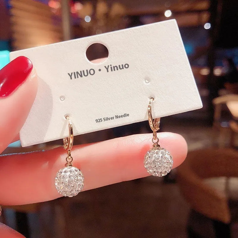 Geometric copper zircon earrings with rose design element in electroplated finish