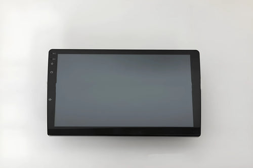 10.1 inch universal Android car head unit with trapezoidal touch screen display and connection ports