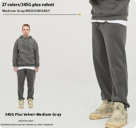 Men's solid colour cotton velvet sweatpants with ankle banding in a mid waist design