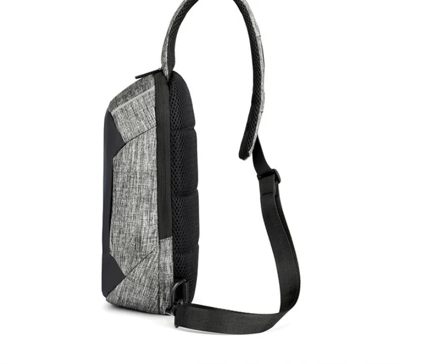 Dark blue waterproof oxford chest bag with adjustable strap, showing front zipper and compact square shape.