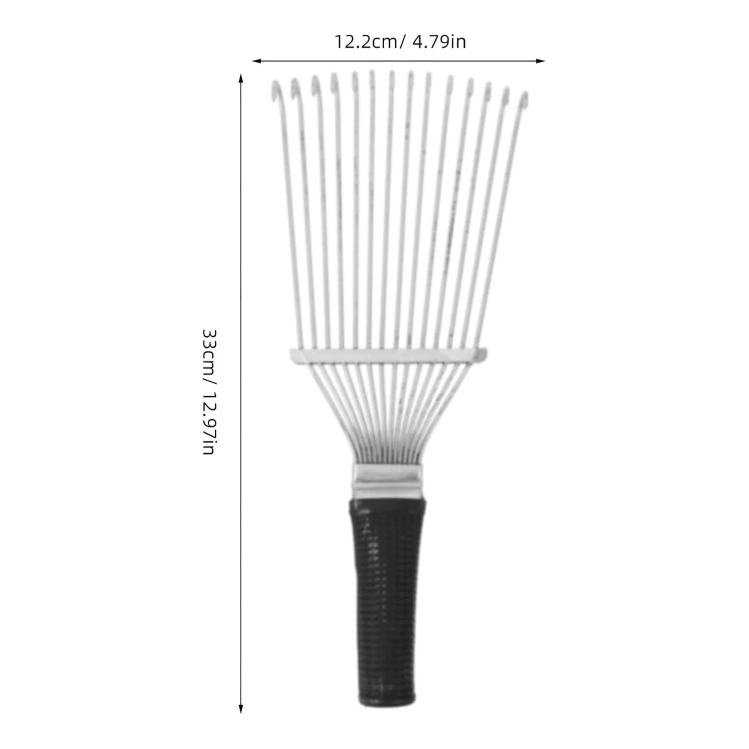 Stainless steel dematting brush and grooming rake for horses and pets on a wooden surface.