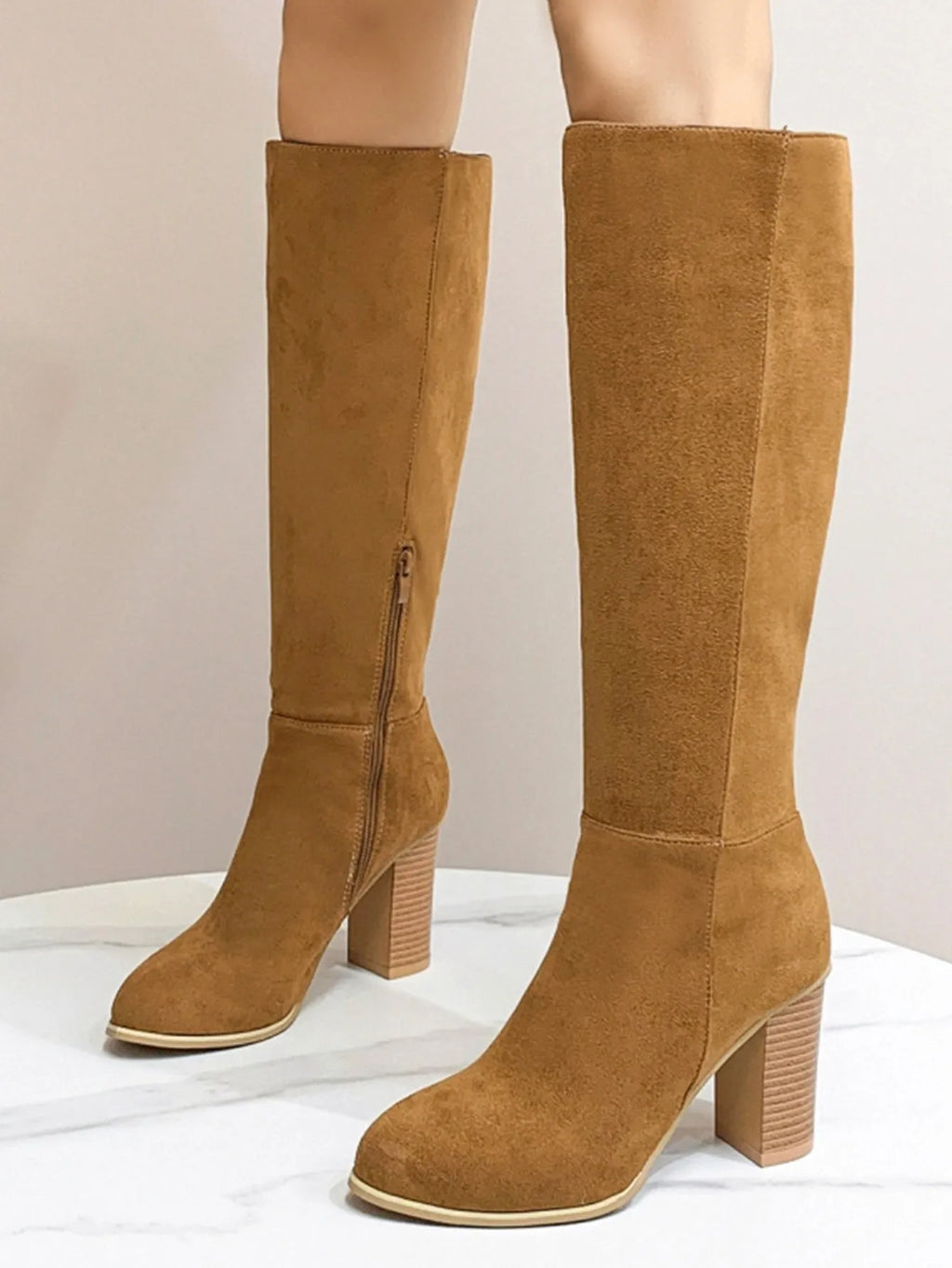 Women's square toe high heel fashion boots in black and dark brown colours showing front view