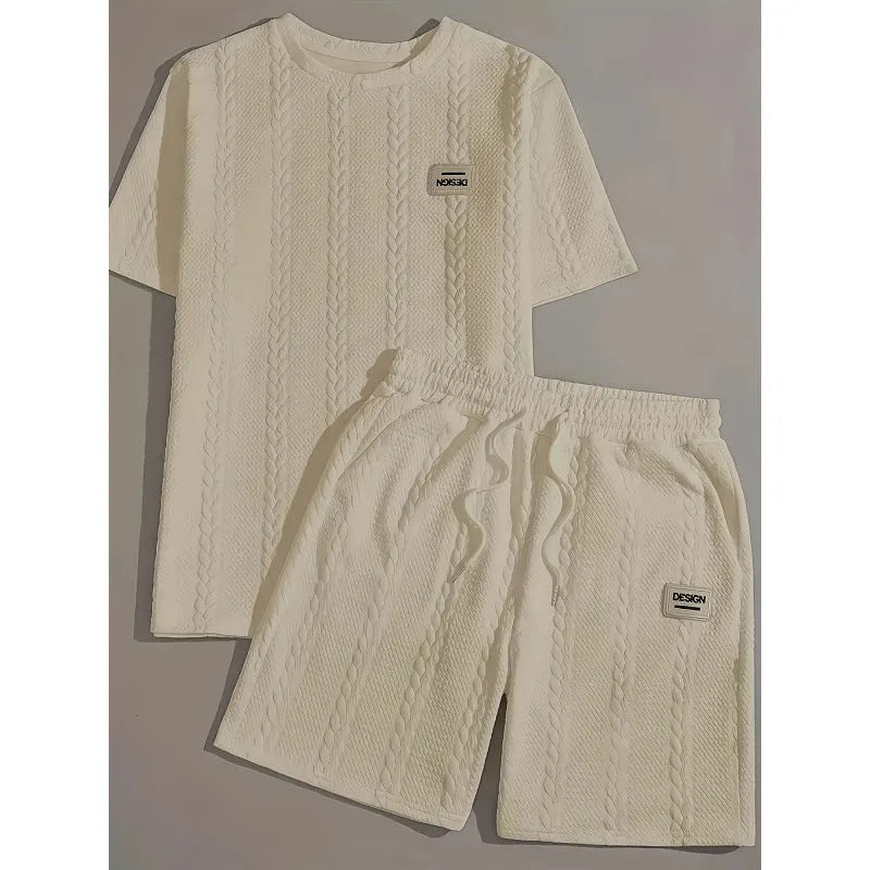 Men's wheat grain tassel knit two-piece set: grey hooded sweatshirt and matching shorts, front view on model