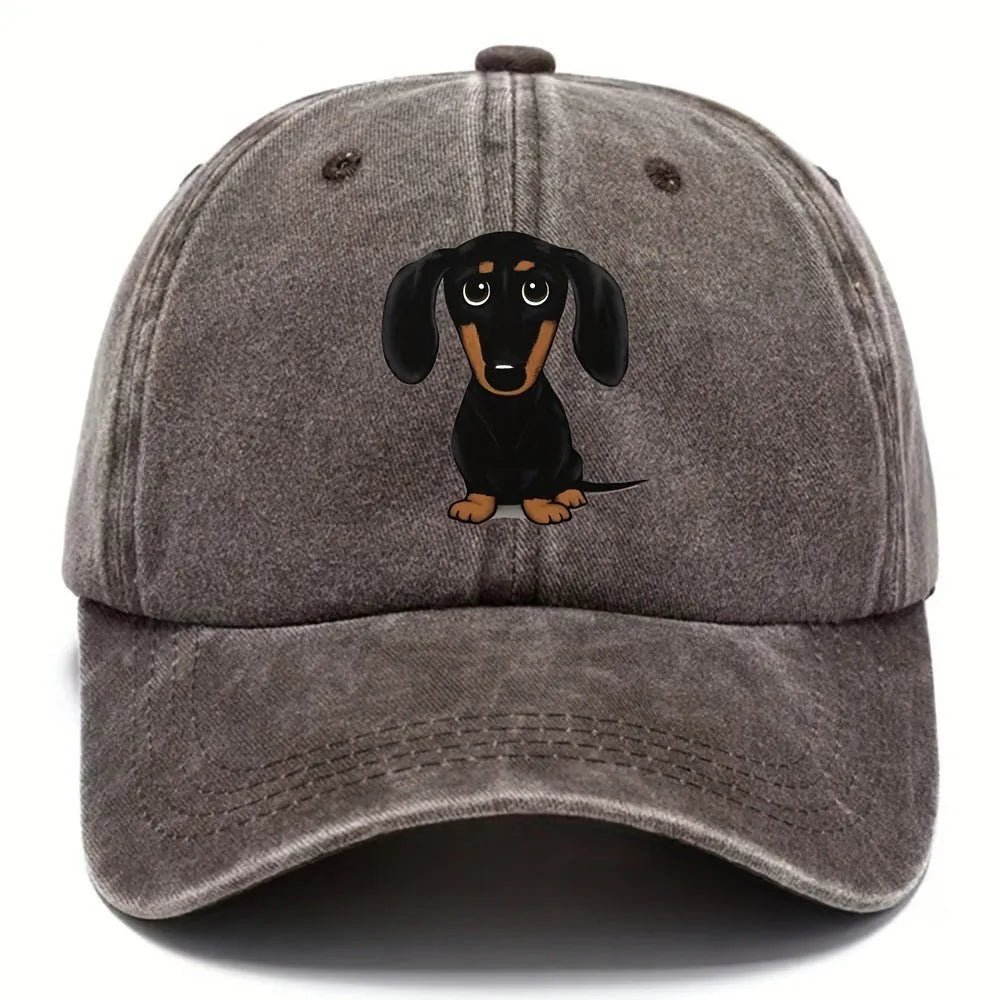 Retro washed blue cotton baseball cap with a white Dachshund embroidery and print on the front.