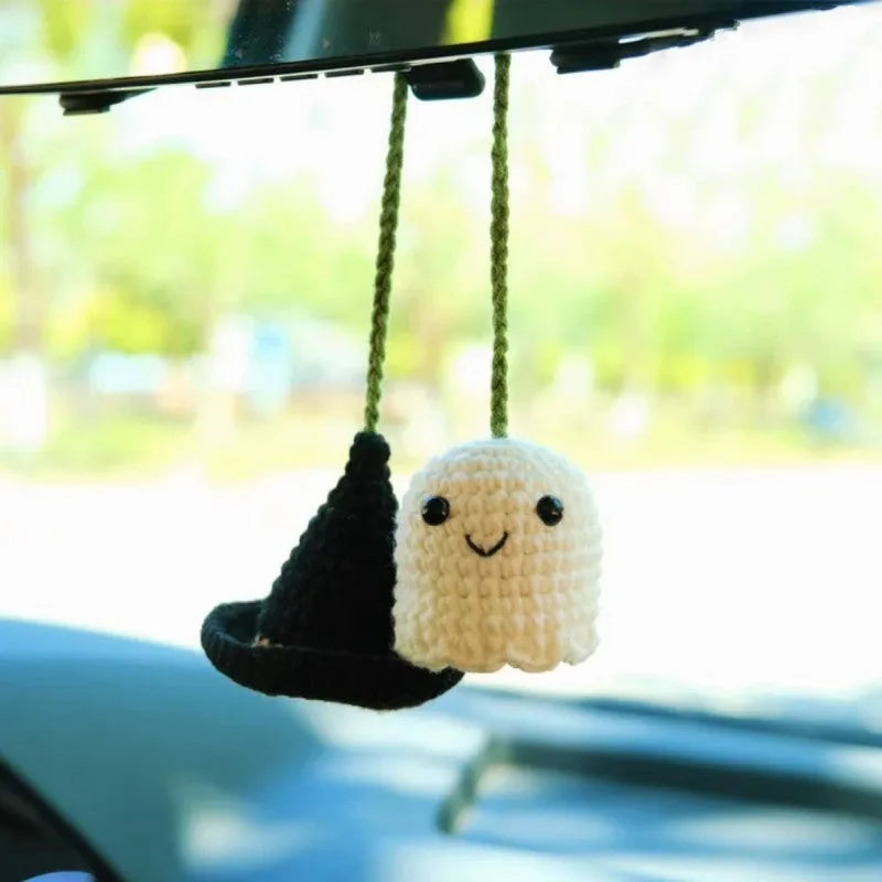 Plush hand-woven car hanging ornament in a cartoon design, made from soft polyester fabric.