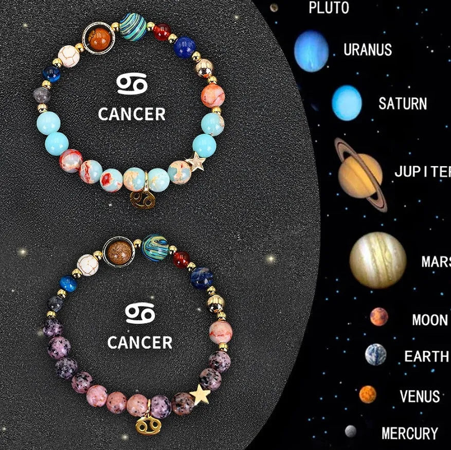 Two adjustable natural stone beaded bracelets with silver zodiac charms on a flat surface.