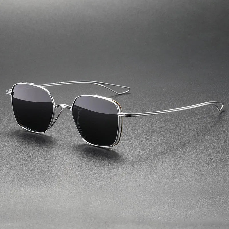Polarized sunglasses with pure titanium frame in box style, gun mount colour with black and gray lenses