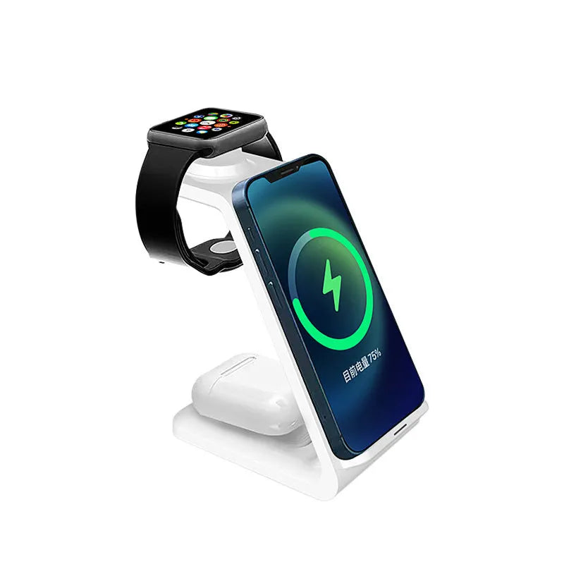 White 3-in-1 wireless charging stand holding a mobile phone, smartwatch, and earbuds on a wooden desk.