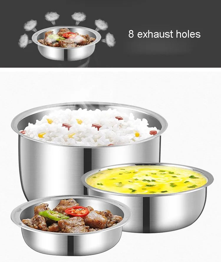 White electric lunch box with USB cable plugged in, showing two-layer food compartments