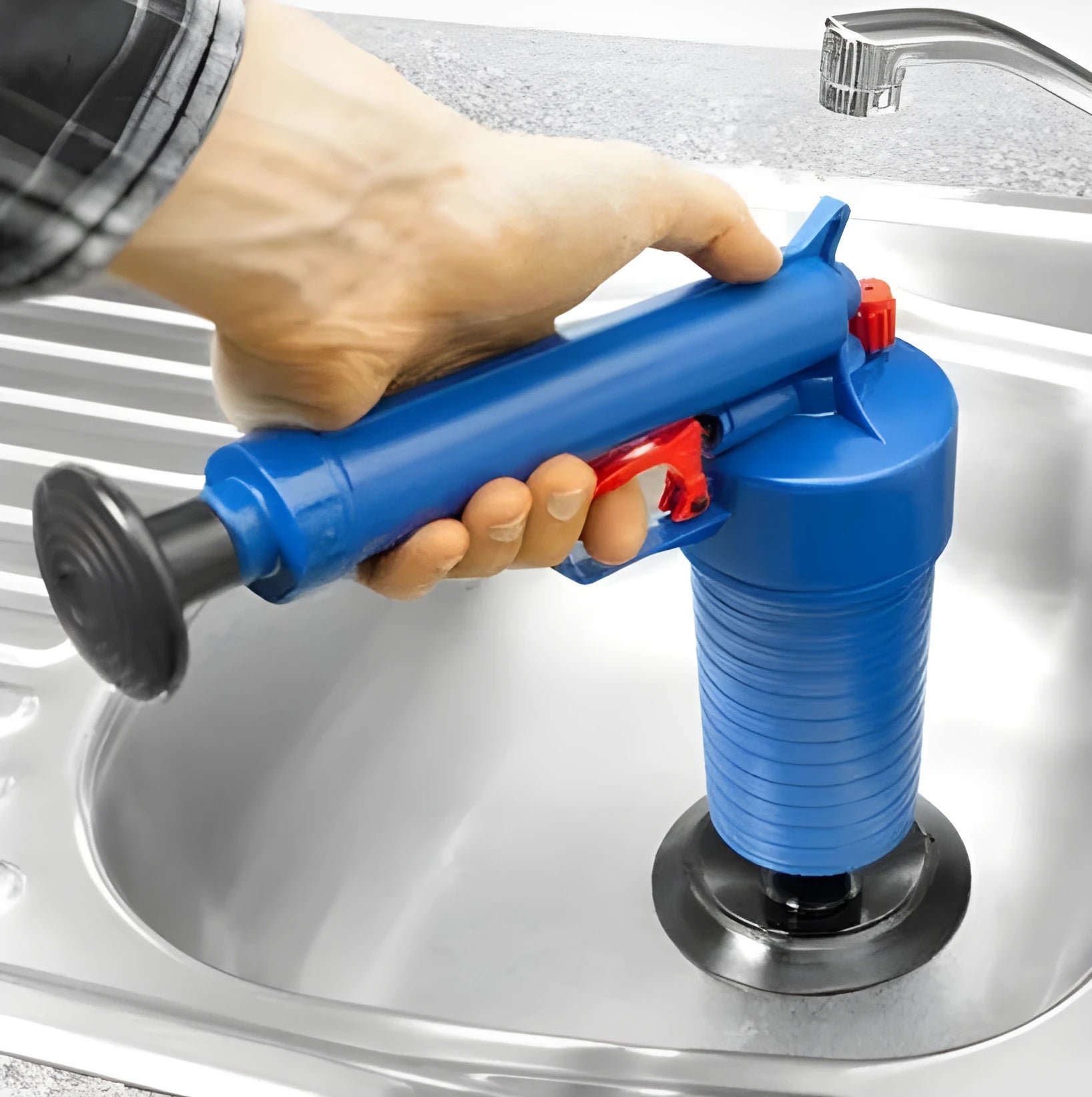 Plastic high-pressure drain blaster gun with four different size adaptor suckers for unblocking sinks and toilets.