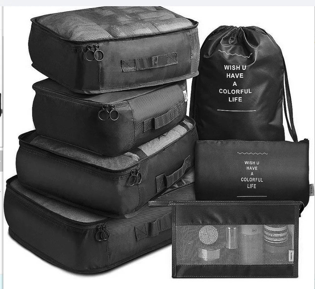 8-piece set of nylon packing cubes in various colours for travel storage of clothes, shoes, and toiletries