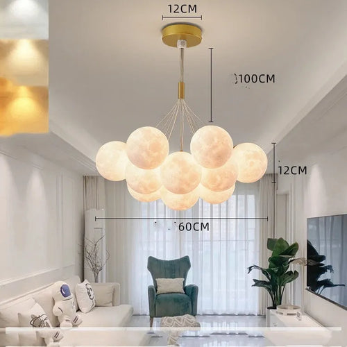 Nordic fish chandelier with moon bubble design in gold or black colours, showing iron body and PMMA lampshades