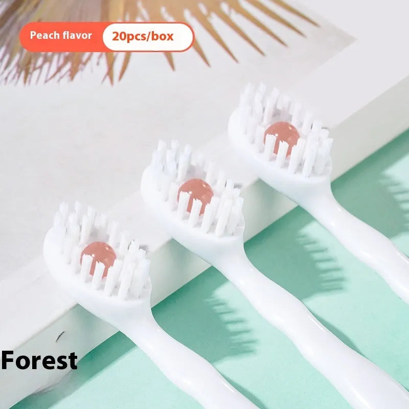 Box of 20 disposable bead toothbrushes in compact packaging for travel hygiene.