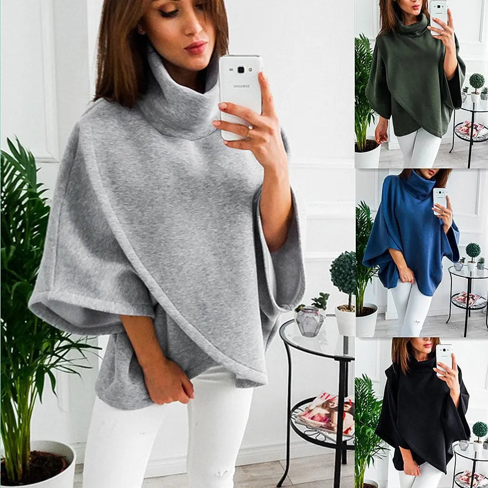 Women's long black batwing cardigan with three-button front and stitching detail, shown extended length.