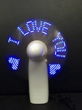 White handheld mini fan with flashing blue and red LED 'I Love You' pattern on display.