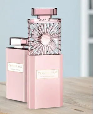 Pink handheld perfume fan with rechargeable battery for fragrance application