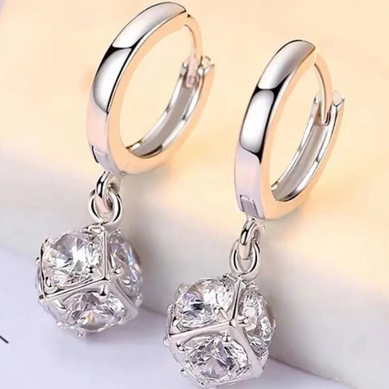 Geometric copper zircon earrings with rose design element in electroplated finish